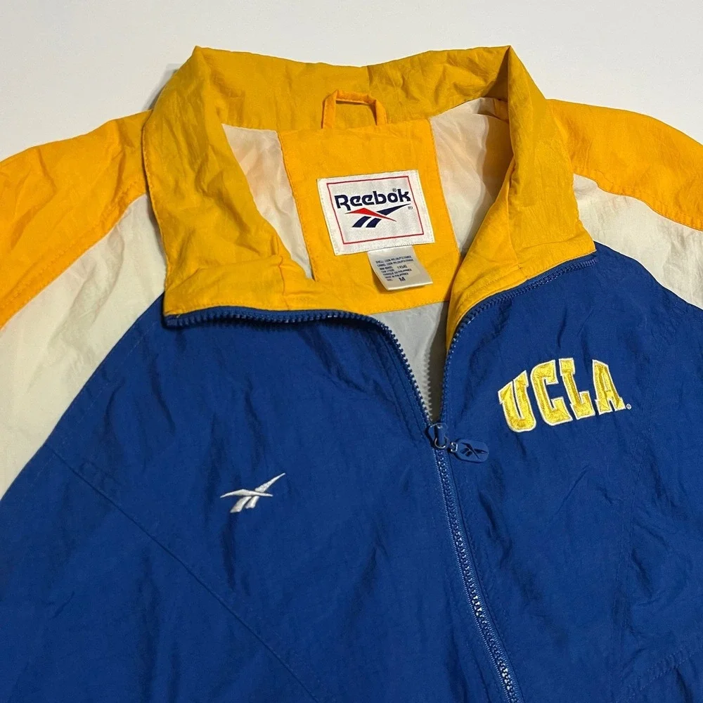 Vintage Reebok UCLA Bruins Nylon Full Zip Windbreaker Jacket unisex MEDIUM Blue